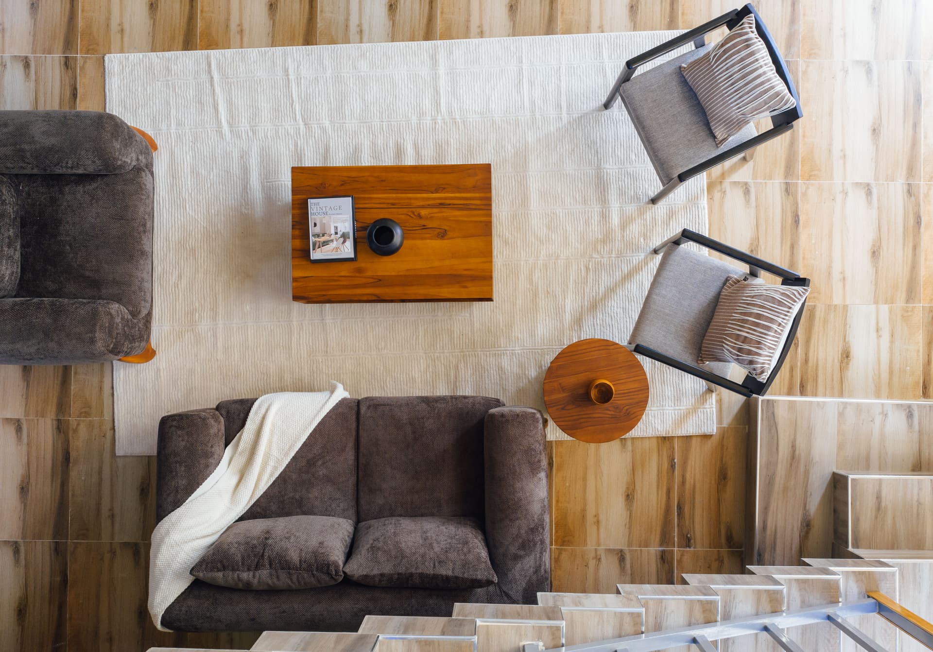 Overhead view of a Starico Residence living room and staircase