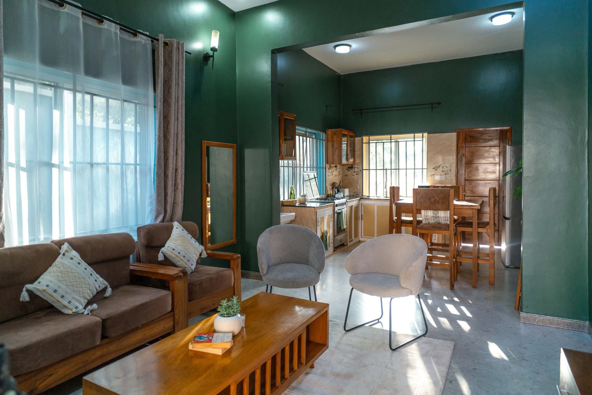 Rift Valley Family Apartment open-plan living room, kitchen, and dining area at Starico Residence